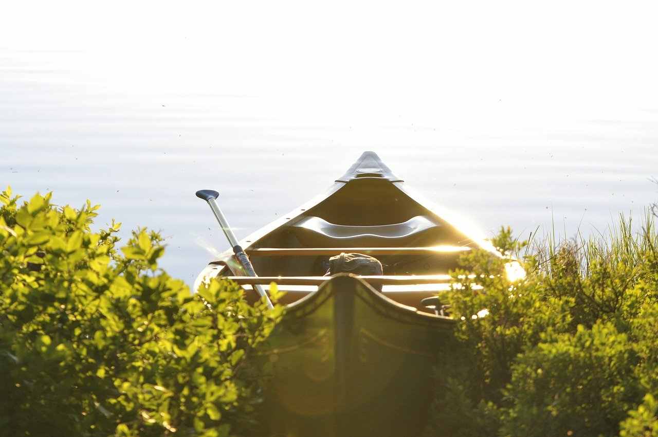 canoe on the edge of water