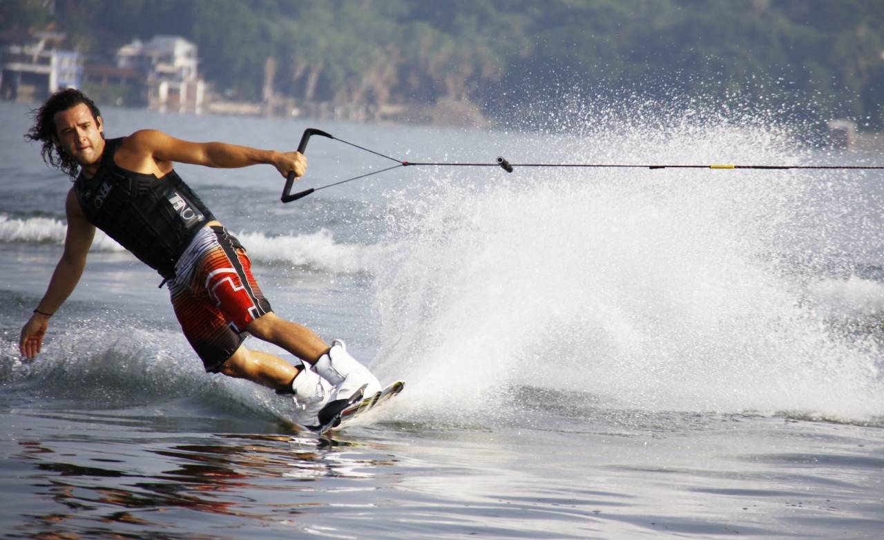 man gliding across water