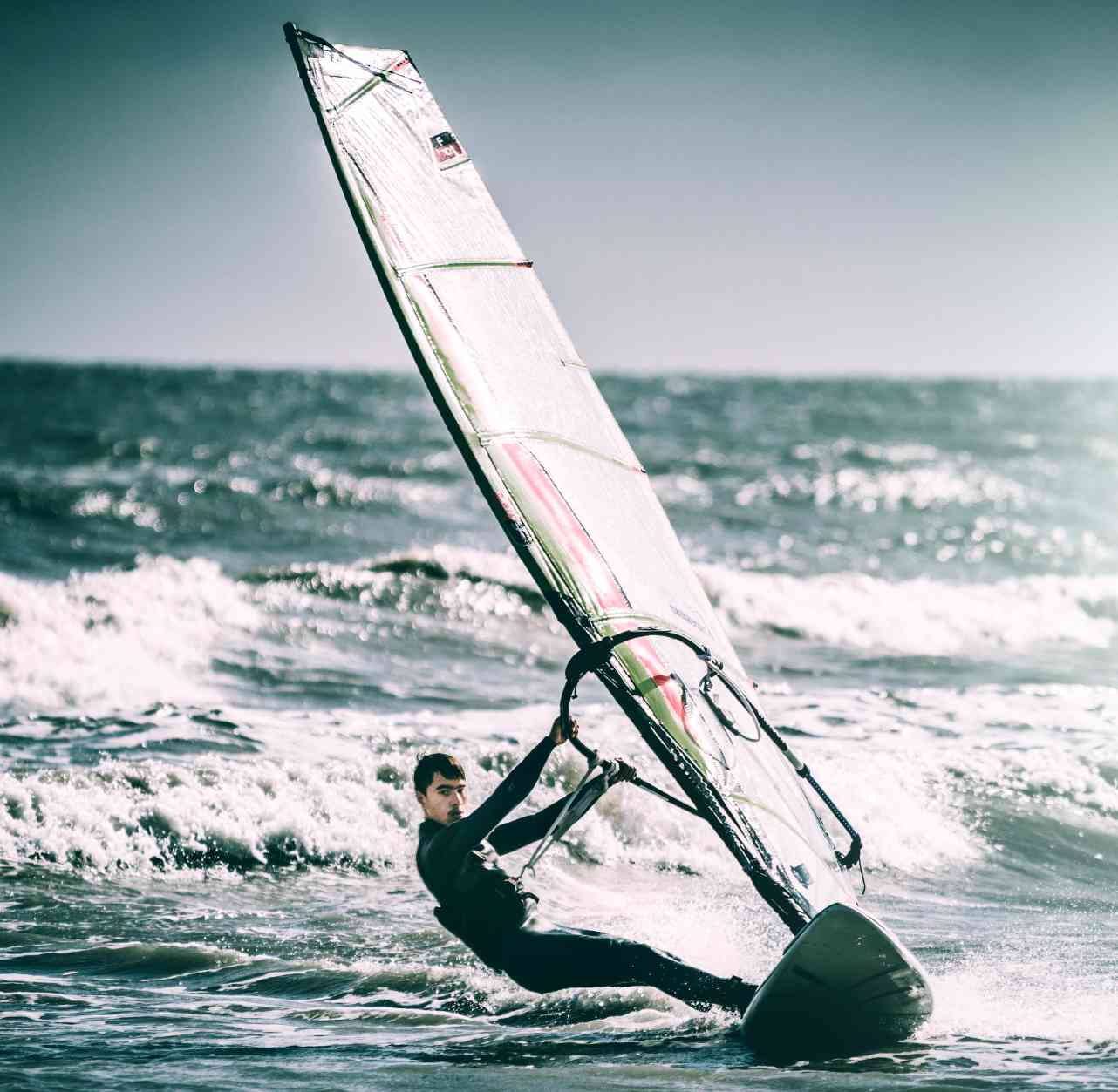 man windsurfing