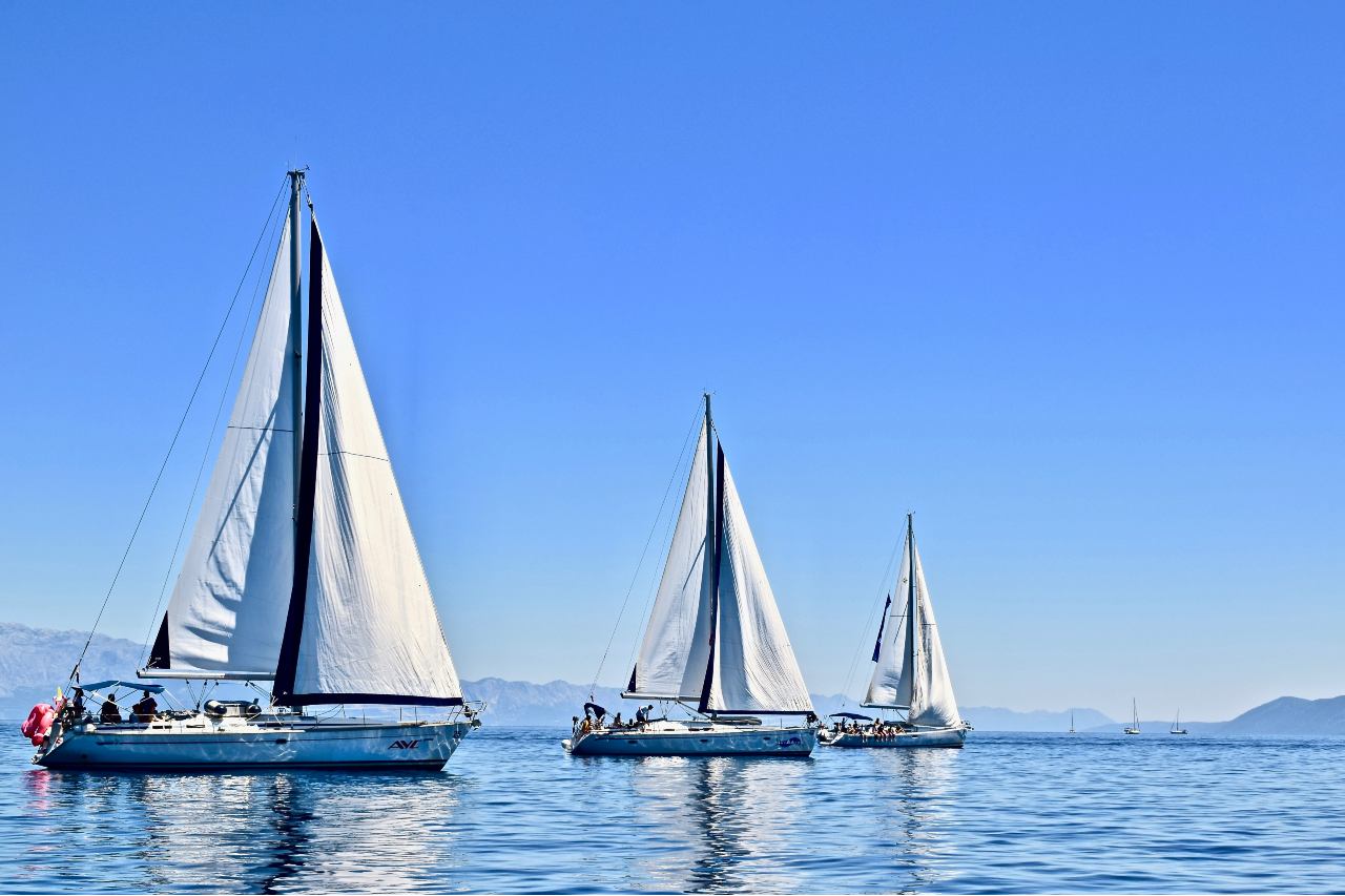 three sailing yachts at sea