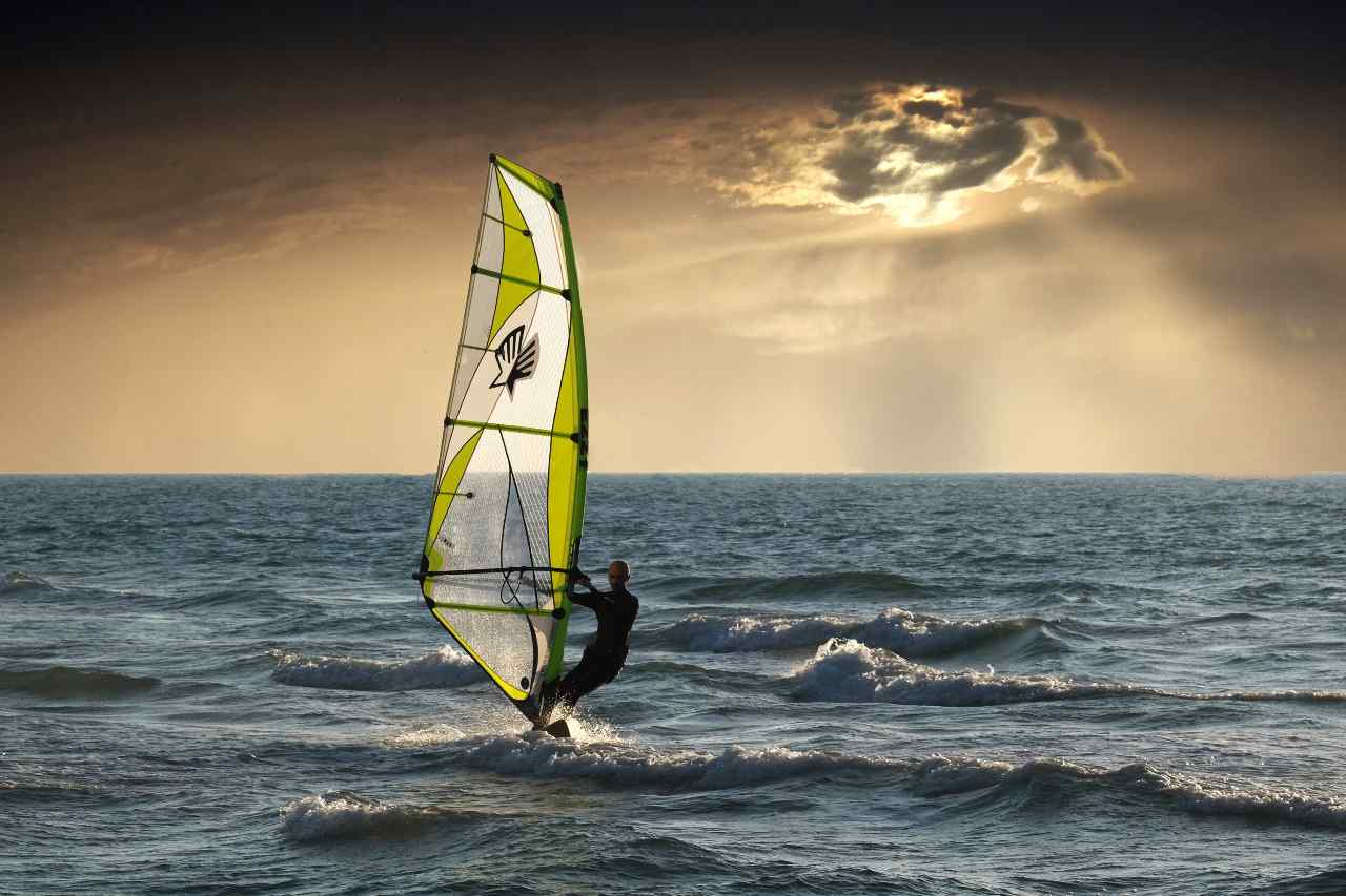 windsurfing at sunset