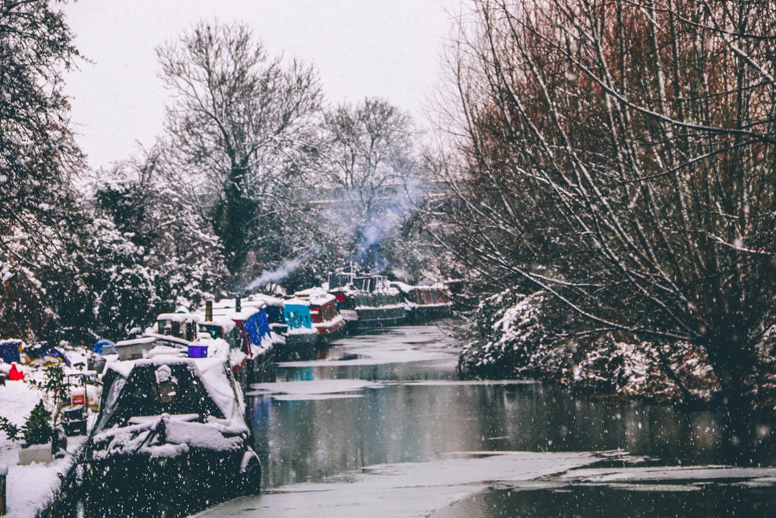 narrowboats covered in snow